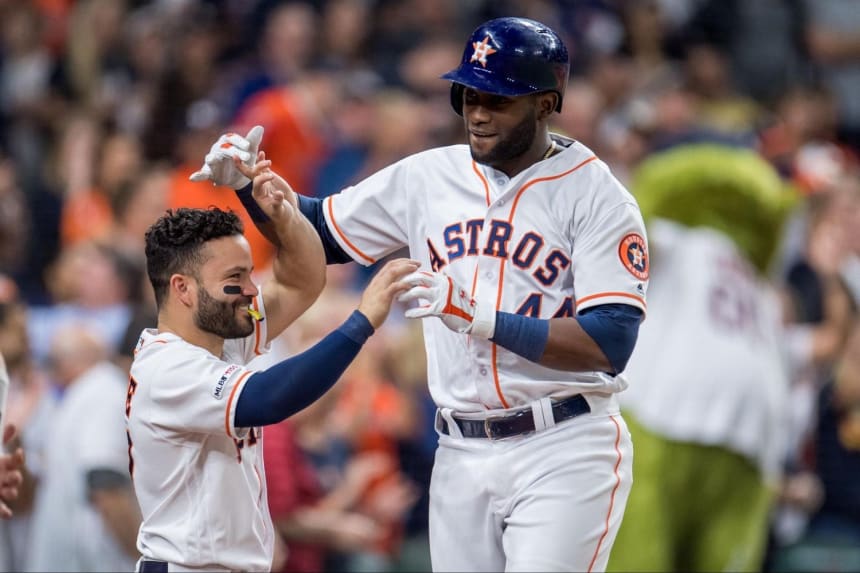 Cuba-born baseball hero Yordan Álvarez gets a celebratory greeting from José Altuve after hitting a home run this fall for the Houston Astros. Photo by UPI via Alamy