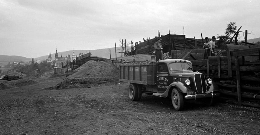 Workers from the J.A. Reedy coal company of Milton, Pennsylvania working outside of Mount Carmel, 1938 (U.S. Office of War Information collections, Library of Congress, public domain). Photographer not idenitifed, but may have been Sheldon Dick since he had been contracted by the federal government to photograph Mount Carmel and other communities in 1938. Wikimedia Commons