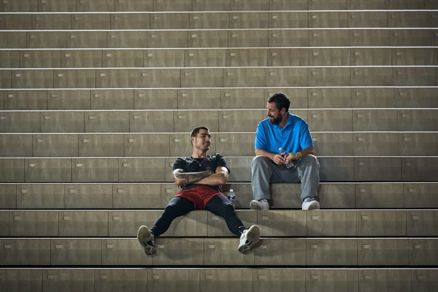 Juancho Hernangomez, left, as Bo Cruz and Adam Sandler as Stanley Sugarman in "Hustle."Scott Yamano/Netflix