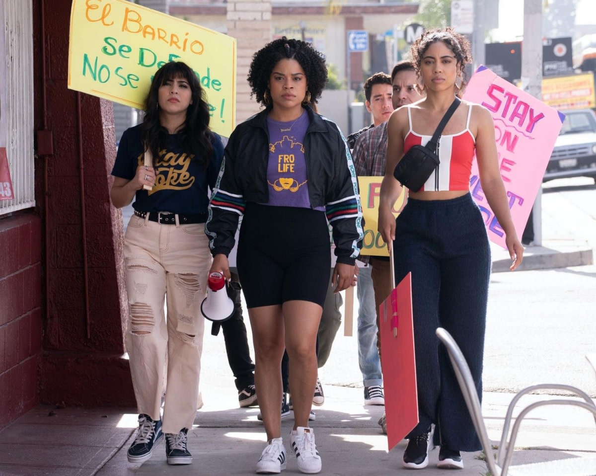 Yessika (Julissa Calderon, center) leads an anti-gentrification protest in a scene from the breakthrough Netflix series "Gentefied," which features Latinos in prominent roles, from acting and writing to directing and production. Photo by Kevin Estrada/Netflix