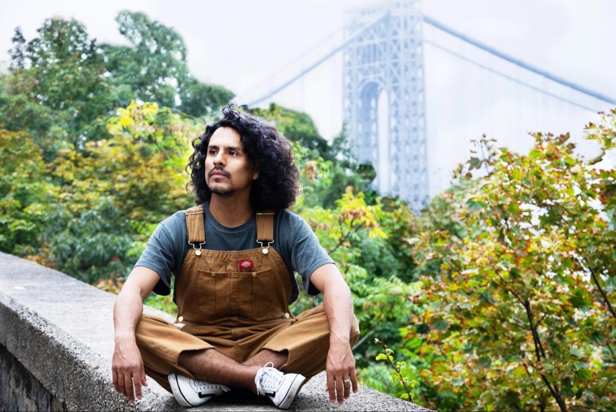 Reza Salazar, near the George Washington Bridge in his New York City neighborhood, Washington Heights. Salazar is using his Broadway star power to work for a more diverse and inclusive entertainment industry, and for equal and just treatment for people in prisons and jails. Photo by Mariela Murdocco