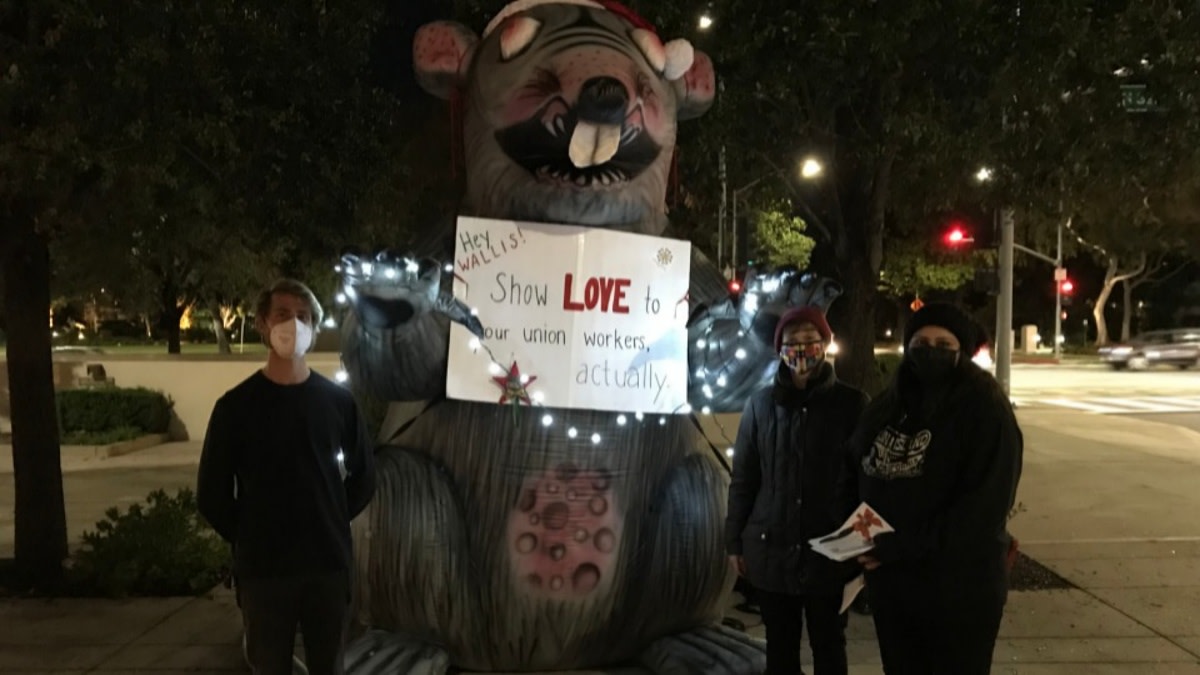Scabby the Rat with union workers (from left) John Conant, Allison Smartt, and Paula Gomez / Eric Gordon for PW