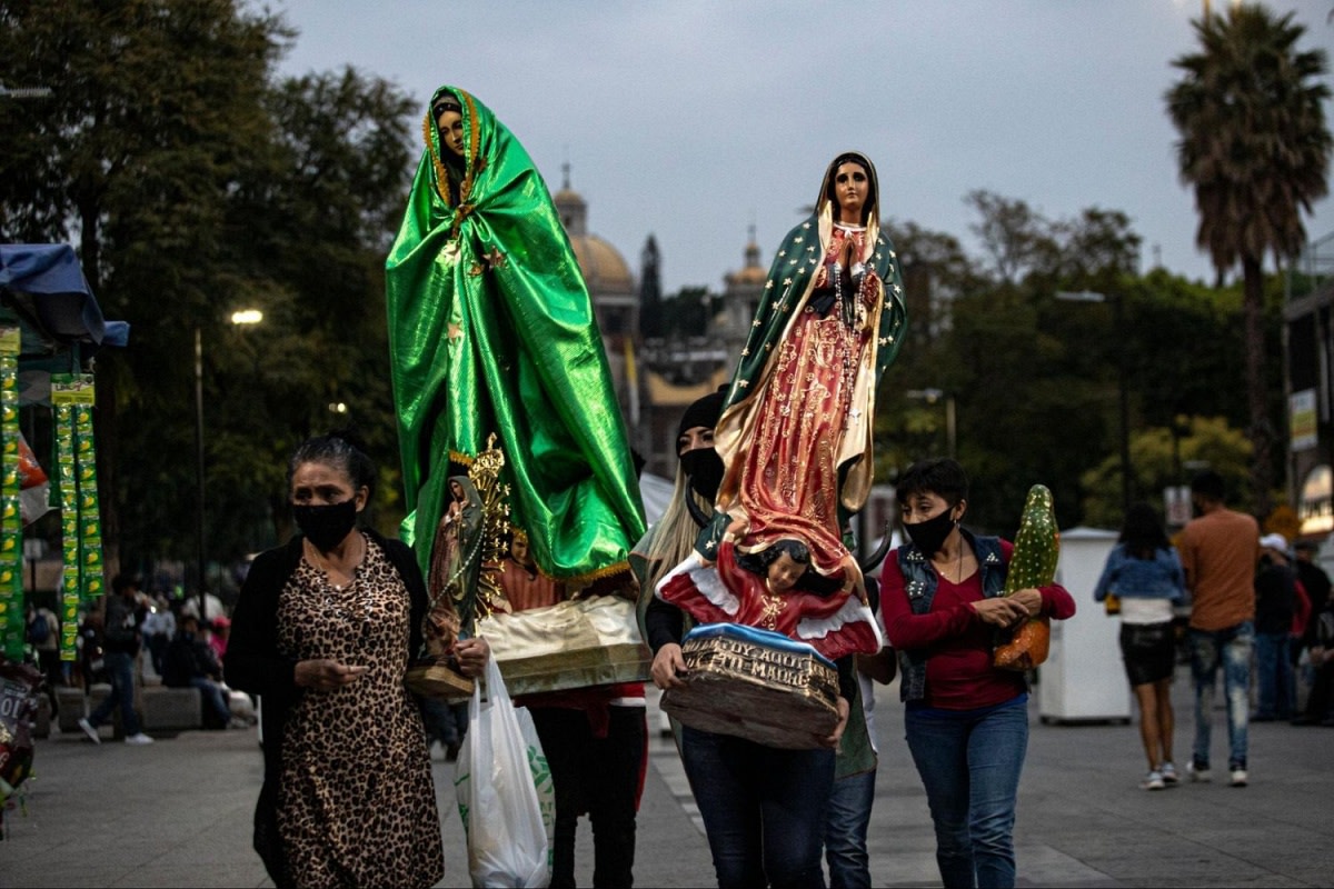 Despite the coronavirus pandemic, thousands of the faithful still visit the shrine to the “Brown Virgin,” near the hill where she is said to have appeared to native Mexican Juan Diego. Before the 1531 apparition, the same hill was believed to be the home of the deity Tonantzín, which in the Nahuatl language means “our mother.” Photo by Julio Ortega via Shutterstock