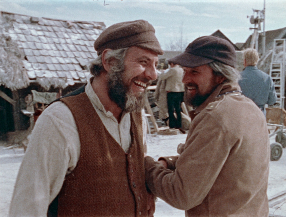 Director Norman Jewison (right) and star Tevye on the set of The Fiddler on the Roof. 
