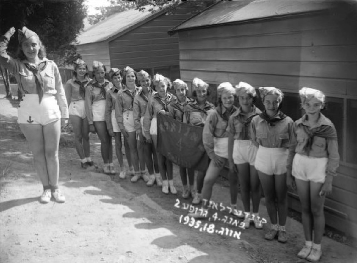 The girls of Bunk 4 salute in August 1935. | Tamiment Library / NYU