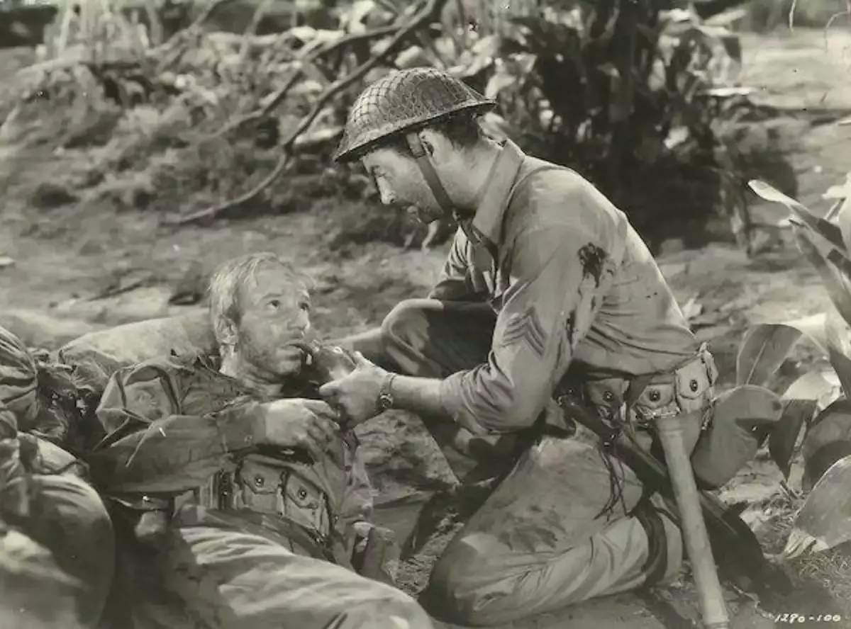 Robert Taylor and Loyd Nolan in a scene from Bataan.
